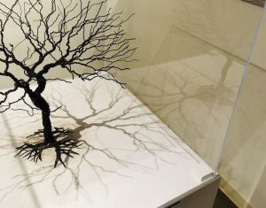 In-game: A sculpture of a tree and root system without leaves.