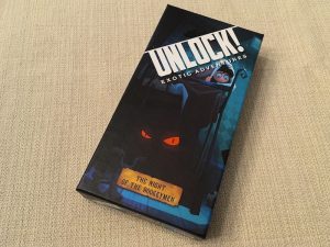 Unlock's The Night of the Bogeymen box art depicts a cartoonish child hiding under the covers from a monster with red glowing eyes under the bed.