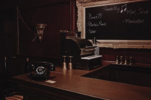In-game: Closeup of an old bar's cash register.