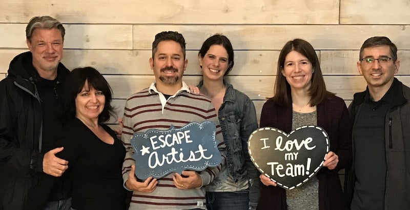 Escape room post-game photo - Diane & Sarah with their significant others and friends