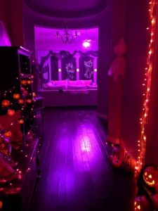A halloway decorated for Halloween.