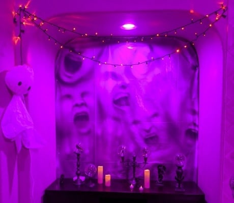 A wall that looks like it has faces trapped within it.