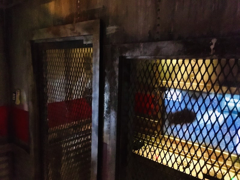 In-game: a heavily worn gate protecting the train engineer's booth.