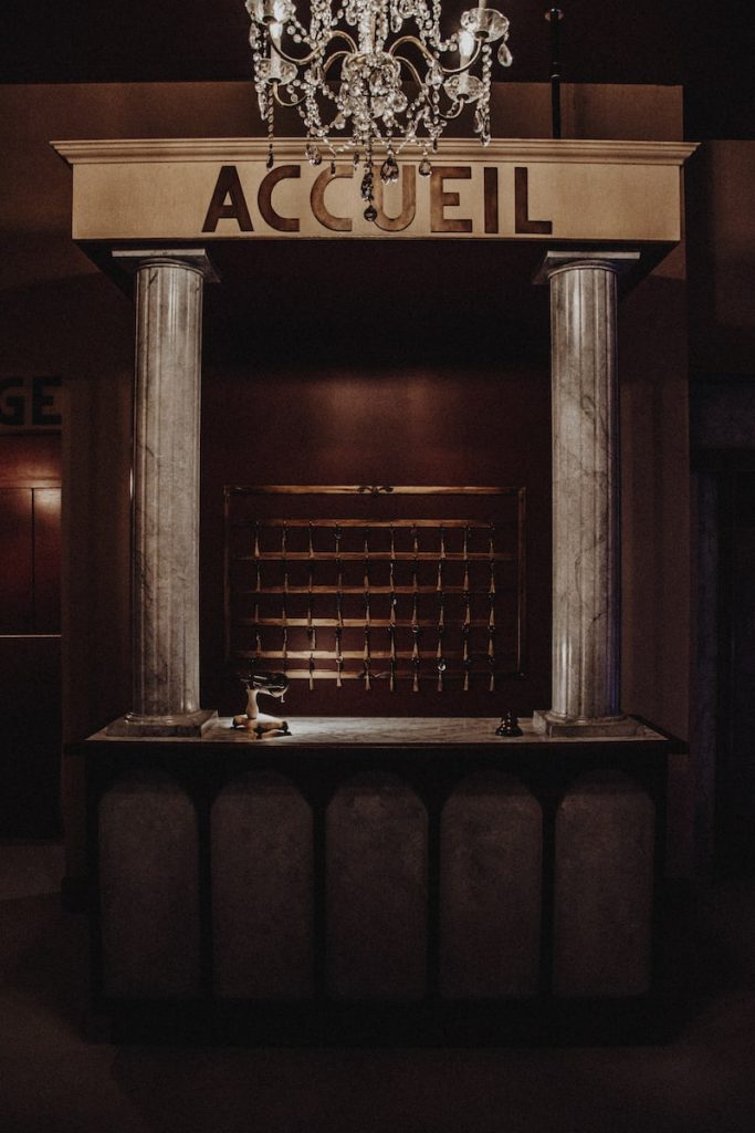 In-game: The front desk of the hotel.