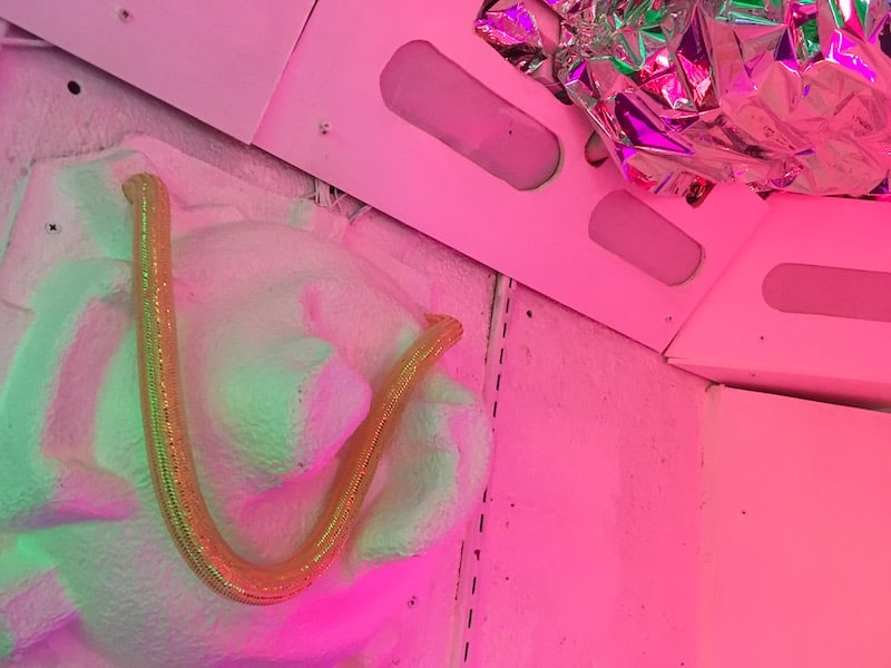 In-game: Closeup of a homemade looking spaceship made from tubing and reminant hardware.