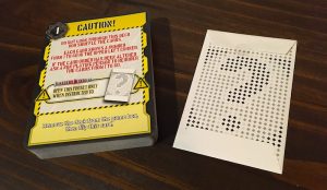 The deck of cards and a mysterious envelope.