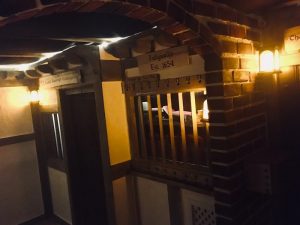 In-game: Storefronts on Pudding Lane.