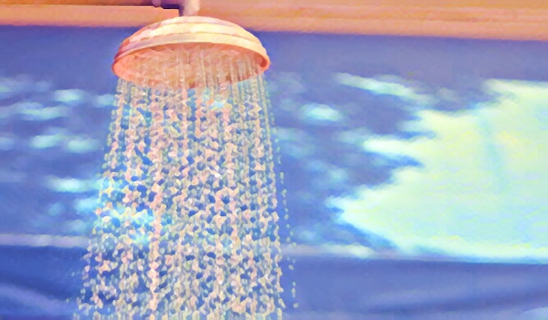A stylized image of a showerhead spraying water.