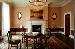 A large room in a stately manor.