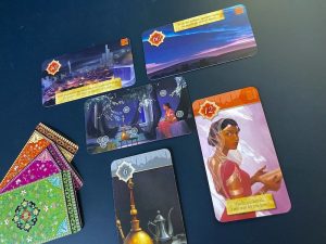 The initial card setup features Scheherazade sitting in a beautiful palace.