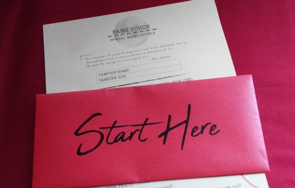 An envelope reading "Start Here" accompanied by a Fang Force Special Agent Profile sheet.