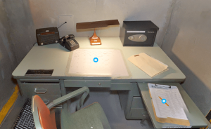 A metal desk in a nuclear bunker.