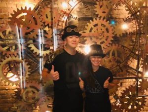 Cici Cao & Brandon Chow in a steampunk game