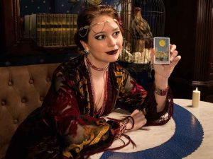 Madame Daphne dressed for an intriguing tarot reading.