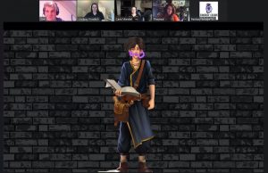 An illustrated young wizard looking character holding a book and appeas to have a purpl mustache grawn on his face.