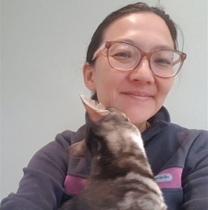 Lee-Fay holding her cat.