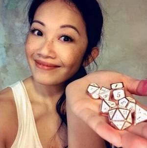 Peih-Gee Law with dice in her hand
