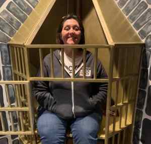 Paula, the owner of Clock N Lock in the unicorn cage.