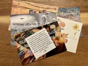 Puzzle post cards fanned out.