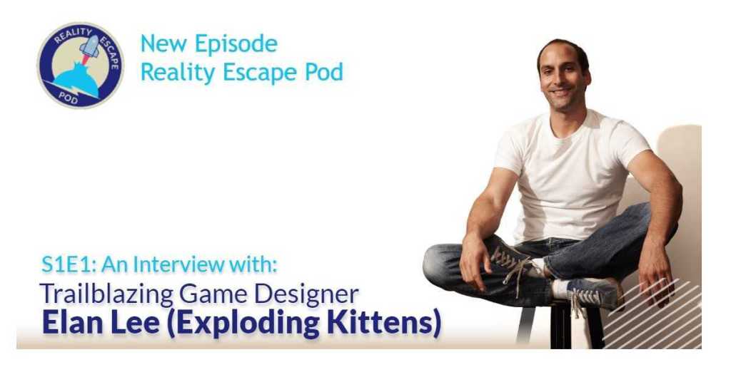 Elan sitting cross-legged on a stool.