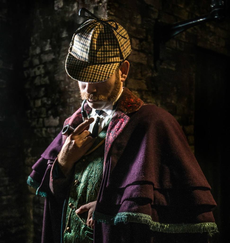 Sherlock Holmes smoking his pipe.