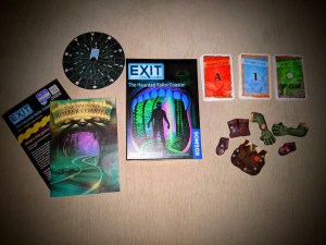Exit The Game Haunted Roller Coaster box and assorted components.