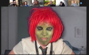A lizard person on Zoom.