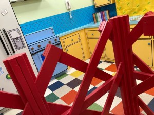 Tommy's animated kitchen viewed through a playpen.