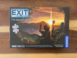 Exit The Game: Sacred Temple box art depicts a south east asian landscape.