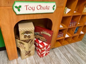 Toy chute filled with toys.