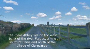 View from a country road in Ireland. Text reads, "The Clare Abbey lies on the west bank of the river Fergus, a mile south of Ennis and north of the village of Clarecastle.