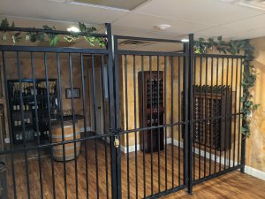 A wine cellar with a drop ceiling.