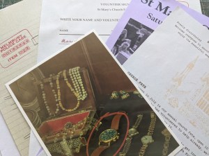 An assortment of crime evidence. In the center of the frame is a photo of a collection of jewelry with a watch circled in red.