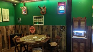 A poker table in an old dive bar.