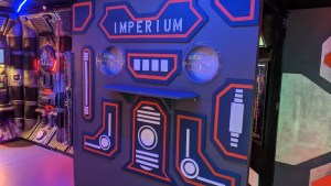 A contraption on a spaceship labeled, "Imperium."