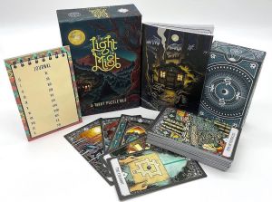 The Light in the Mist box and full contents, including tarot deck, booklet, and journal.