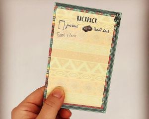 Backpack, with items written on it.