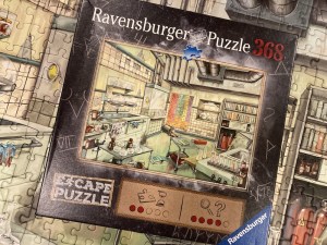 The Laboratory box sitting on top of the solved puzzle.