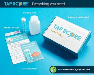 Tap Score home water testing kit contents, includes instructions, sampling vials, chlorine test strip, and box.