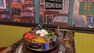 Hotpot sitting on a table.