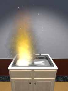 Fire burning in a kitchen sink.
