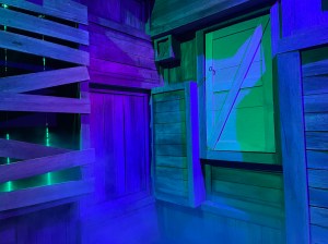 An assortment of wooden crates dramatically lit.