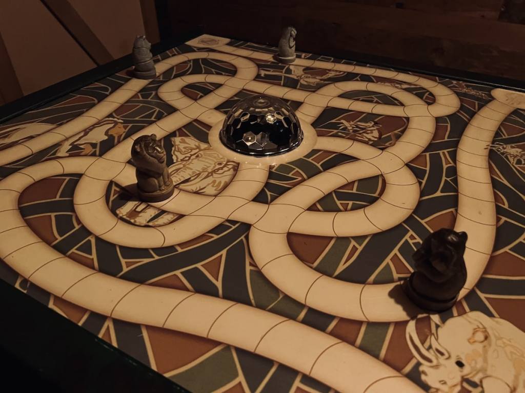 Closeup of a Jumanji board game.