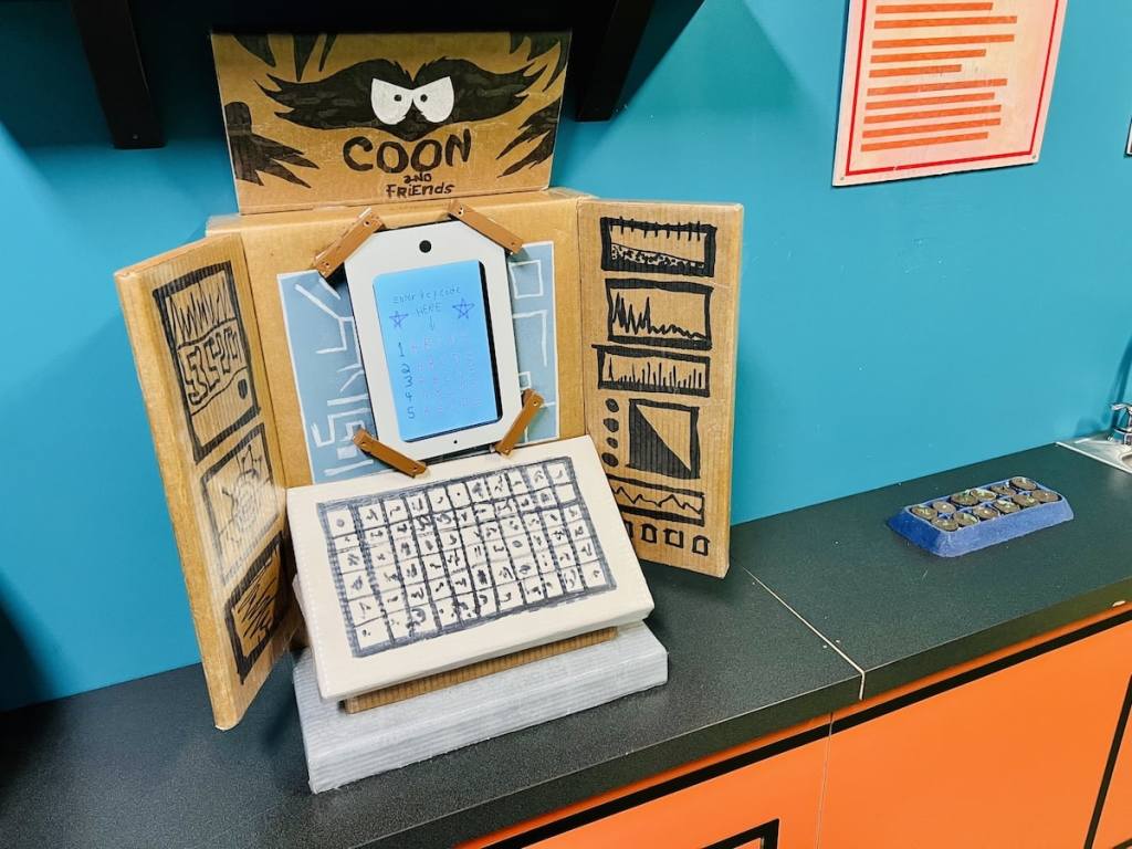 Cartman's Coon & Friends super computer made out of cardboard and an iPad.