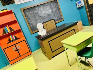 South Park Elementary classroom. "Biology Basics" is written in chalk on the blackboard.
