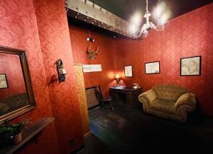 A red walled doctor's study.