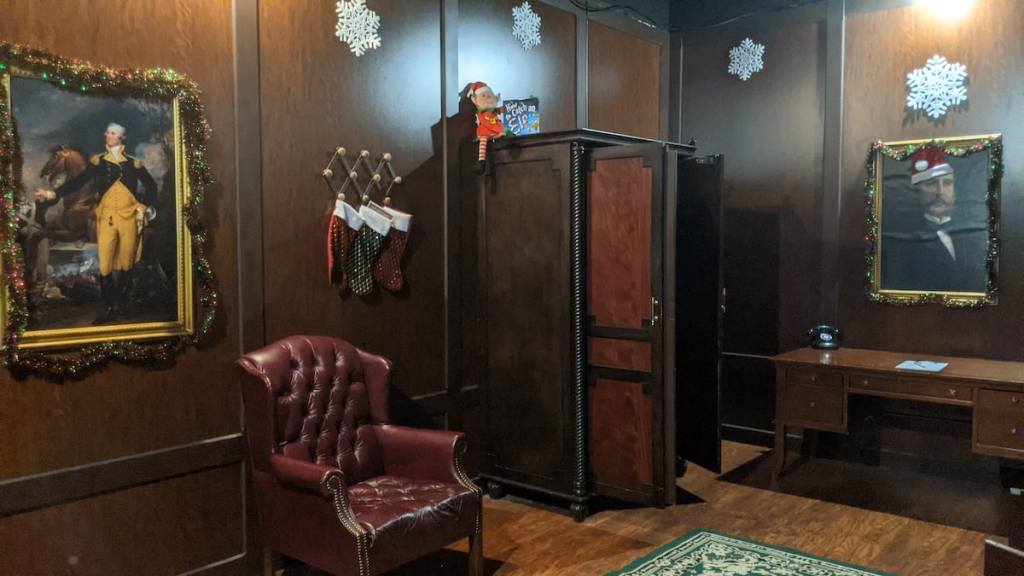 An elegant study decorated for Christmas.