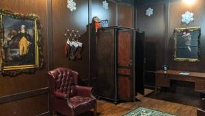 An elegant study decorated for Christmas.