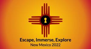 Escape, Immerse, Explore, New Mexico 2022 banner, has teh sun insignia of New Mexico with a keyhole in the center.