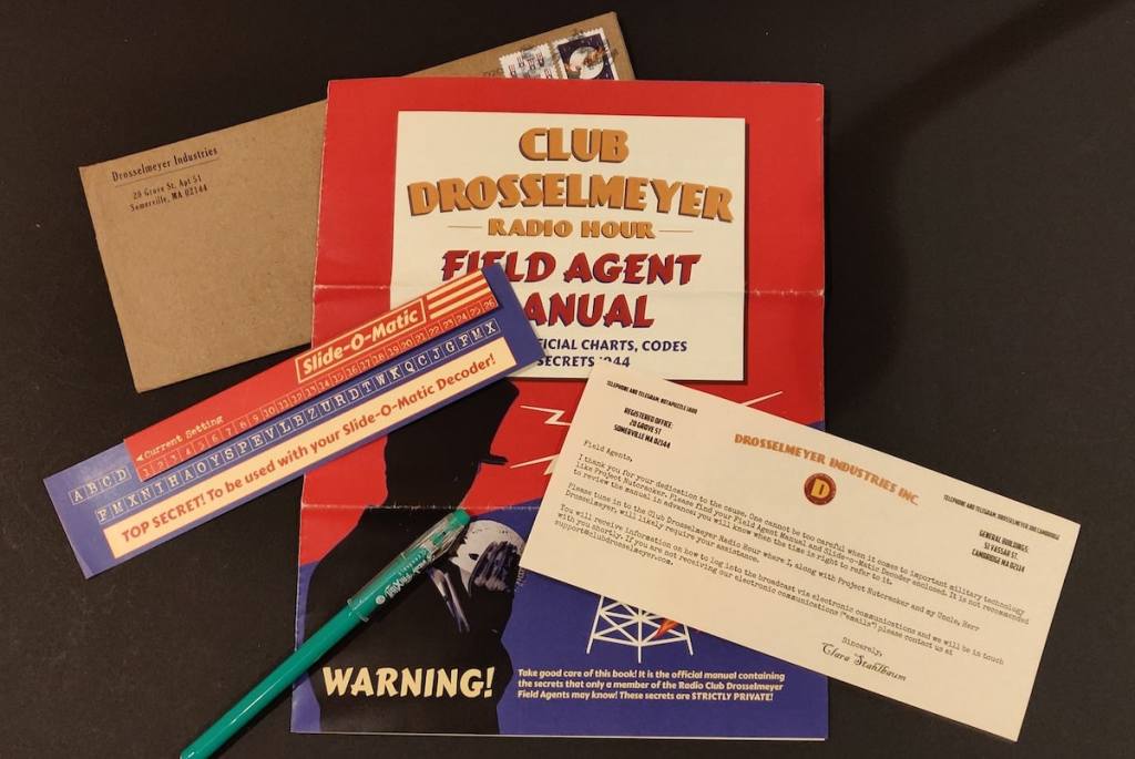 Club Drosselmeyer Radio Hour Field Agent Manual, a long with a letter and a slide-o-matic code decoder.